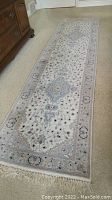 Full-length overhead view of the runner on carpeted floor