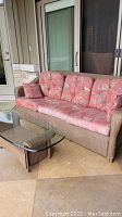Front view of sofa and coffee table on patio