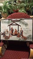 Box front showing the nativity set image and Kirkland branding with 18-piece description.