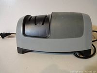 Top-down angled view showing sharpening slots of the Smith's electric sharpener