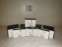 Front view of 20 bars of Bee Kind Cleansing Soap arranged in a display.