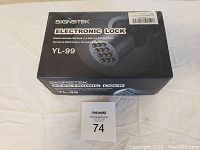 Box showing Signstek branding and model YL-99 electronic lock