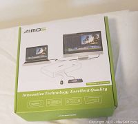 Box of the Aimos HDMI KVM Switch showing usage diagram and port types.
