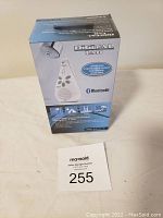 Photo of the boxed Digital Lab waterproof Bluetooth speaker, model DL3197-40, with MaxSold auction tag 255 in front.