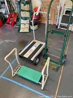 Photo shows the garden kneel assist, rolling cart, and dolly together on garage floor with other items in the background.