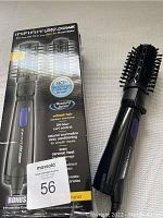Infiniti Pro Conair rotating brush and original box with product features and branding visible.