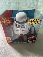 Front view of the Star Wars Mr Potato Head Spud Trooper toy in original packaging showcasing the character design and branding.