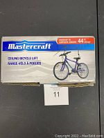 Mastercraft Ceiling Bicycle Lift box showing front with product image and weight capacity (44 lbs).