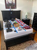 Full view of headboard and footboard installed around mattress