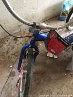 Front view showing 26″ front wheel, Schwinn badge and handlebar assembly