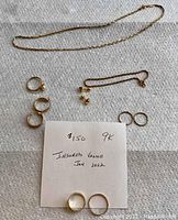 Overview of necklace, bracelet, rings, earrings and insured value note