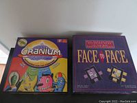 Two board game boxes: Face to Face 1993 edition and Cranium 2005 Canadian edition side by side.