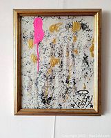 Frontal view of original abstract painting showing pink drip streak, gold and black splatter accents. Signed lower right.