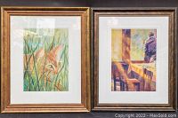 Two framed paintings side by side, showing the overall look of the lot