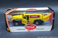 Front view of the 1940 Ford Coca-Cola delivery truck die-cast model in original packaging, showing branding and colors.
