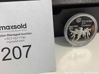 Coin obverse showing Olympic runners, horse rider, Montreal 1976, Olympia XXI, and 10 dollars denomination.