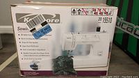 Photo of Kenmore 20-15510 sewing machine box showing product photo and features list.