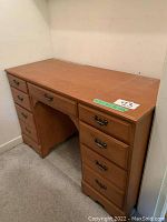 Photo of the wood desk showing front and drawers.