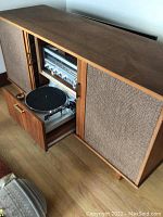 Open front view of console showing receiver and turntable