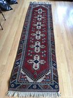 Full view of runner rug laid flat on hardwood floor