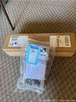 Karben Sports Skater Aid roller skate trainer box and plastic wrapped rolling cart.