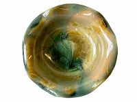 Top view of the scalloped edge bowl showing green, yellow, cream organic glaze pattern inside the bowl