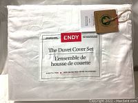 Photo of the duvet cover set packaging label showing brand Endy, 300 thread count, 100% organic cotton, king size and product name The Duvet Cover Set.