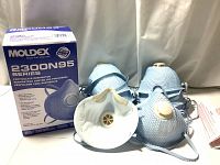 Box of Moldex 2300N95 Series particulate respirator masks, set of 10, with 4 masks displayed showing blue Dura-Mesh shell, white exhale valve, elastic head straps and foam nose cushioning.