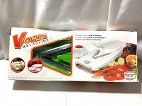Retail box showing product image and brand V-Power Mandoline. Box shows wear, background white.