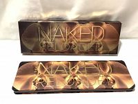Closed Urban Decay Naked Reloaded Eye Shadow Palette in original box showing lid design.