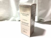 Photo of front side of the sealed boxed Dior Capture Totale Le Serum refill product showing product name and branding.