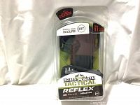 Front view of Uncle Mike's Tactical Reflex Holster in original sealed packaging showing product branding and size information.