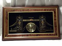Full view of framed vintage Ken Broadbent Tower Bridge collage wall clock with timepieces embedded in the towers and a central clock face.