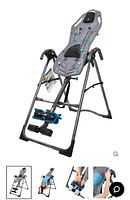 Front view of Teeter inversion table showing frame, backrest, handles and ankle holders