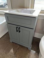 Front view of Moss Grey bathroom vanity with white integrated sink