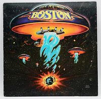 Front cover of the 1976 Boston self-titled album, showing spaceship and earth design with vibrant colors and 'Boston' logo.
