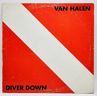 Front cover of the Van Halen "Diver Down" vinyl record showing red and white diagonal design with title and band name