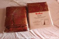 Curtains packaged with label showing brand and style.