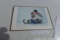 Front view of the print showing the Indigenous mother and child image titled 'Tender Moment'