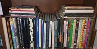 Shelf with graphic design books, showing a variety of titles and publishers