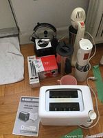 Full group showing all appliances: kettle, toaster, milkshake machine, coffee maker, mixer, and accessories.