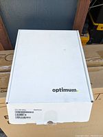 Sealed white box with Optimum branding on top, containing the SAGEMCOM modem.