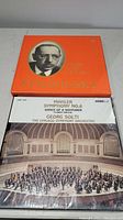 Covers of Mahler Symphony No.6 by Georg Solti with Chicago Symphony Orchestra and Igor Stravinsky record set with orange cover