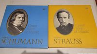 Blue cover of the 'Great Men of Music' set featuring Robert Schumann with a monochrome portrait and gold lettering.