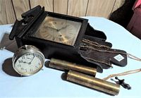 Full view of Olympia pendulum clock, weights, chains, and Westclox Big Ben alarm clock