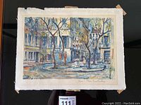 Full view of the signed watercolor painting showing Paris street scene at Place Furstenberg with buildings, leafless trees, and two figures walking.