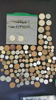 A collection of approximately 70 coins from the 1960s including copper and silver toned coins. Coins vary in size and wear.