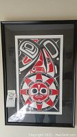 Full view of framed print showing Raven Sun artwork in black frame