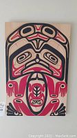 Full front view of wood carved native art wall hanger
