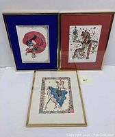 Overall view of three framed watercolor artworks by Louis Renaud